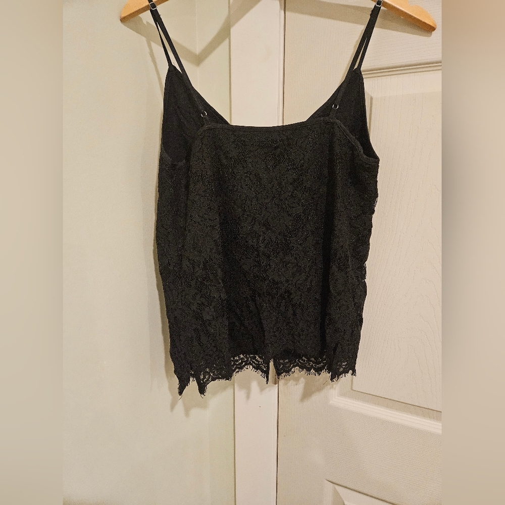 Brand new, never worn. Removed tags and couldn't return.